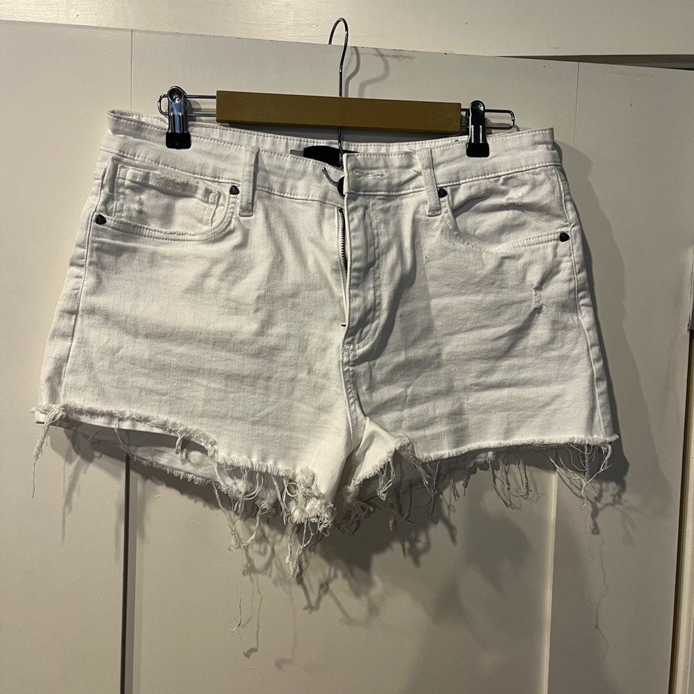White cutoff shorts